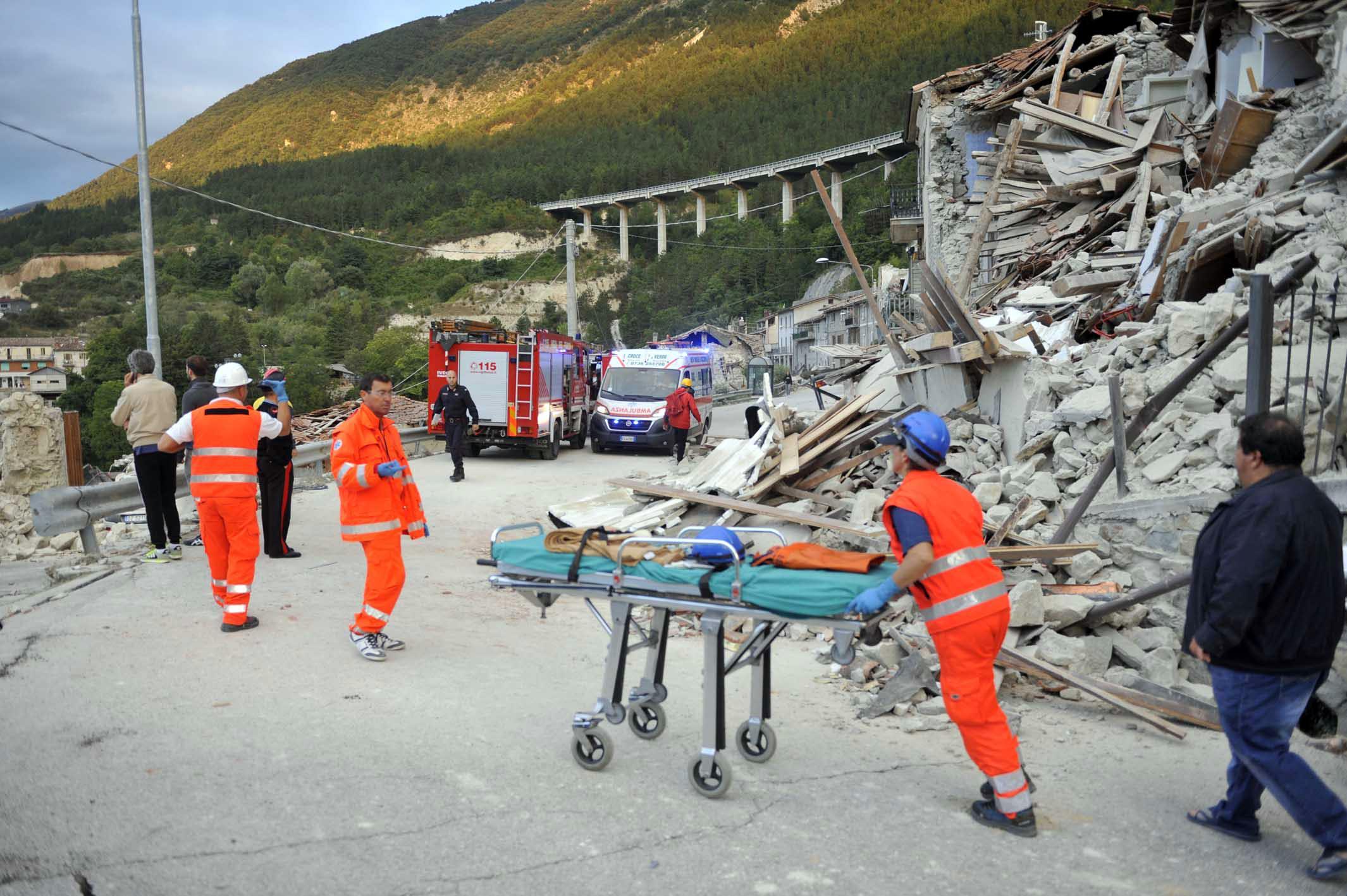 The rescuers in Pescara del Tronto, near Arquata del Tronto, Ascoli Piceno, in Marche Region, 24 August 2016. A 6.1 earthquake struck just after 3:30 a.m.. The quake was felt across a broad section of central Italy, including the capital Rome where people in homes in the historic center felt a long swaying followed by aftershocks. ANSA/ CRISTIANO CHIODI