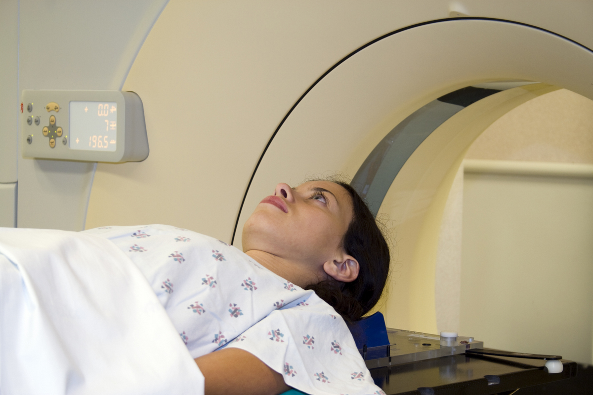 Young Woman on CAT Scan Table